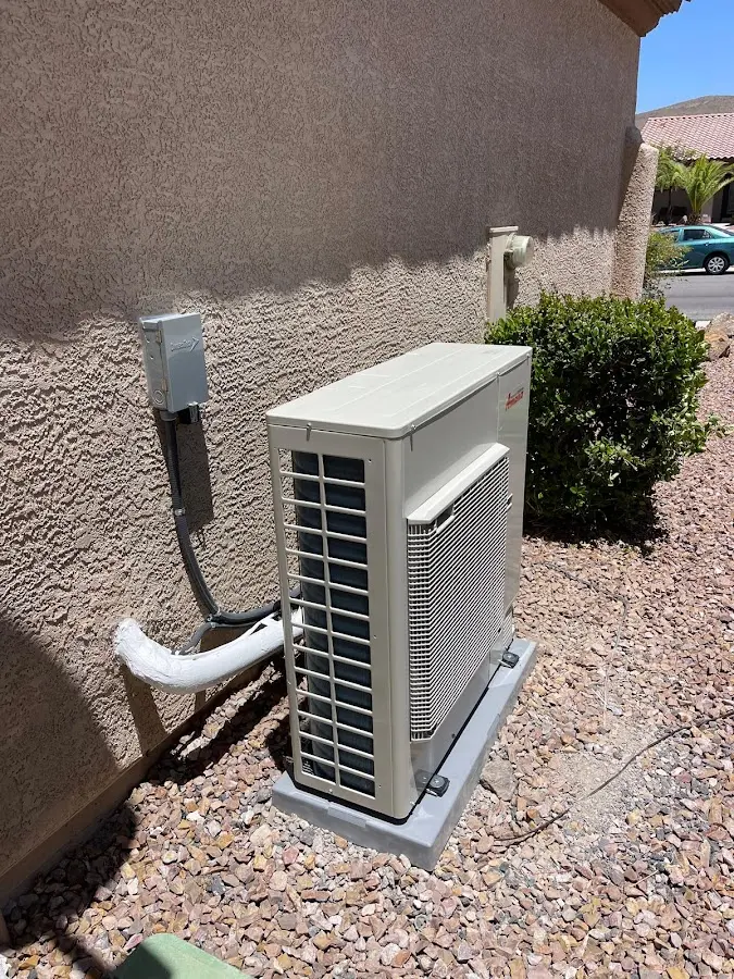 Residential air conditioning condenser unit in McKenzie